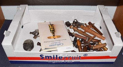 Lot 277 - A collection of various corkscrews and bottle openers, including: various examples with wood...