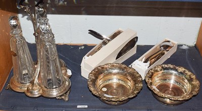 Lot 278 - Quantity of silver plate to include three bottle decanter stand, a pair of bottle coasters and flat