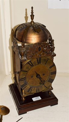 Lot 279 - A brass striking lantern clock, dial centre later engraved Nicholas Coxiter, Smiths Hall,...