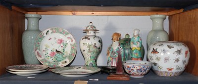 Lot 307 - Chinese porcelain comprising two famille rose figures with one wood stand, two pairs of plates with