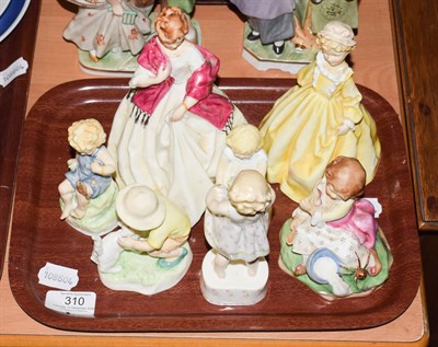 Lot 310 - A group of seven Royal Worcester figures comprising; FIrst Dance, Grandmothers Dress, Teatime,...