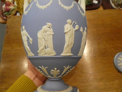 Lot 318 - A Wedgwood blue Jasper ware urn and cover decorated in the Classical taste with the Greek muses...