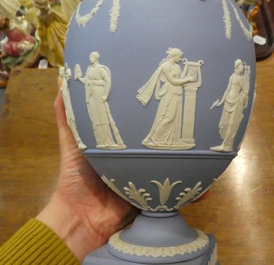 Lot 318 - A Wedgwood blue Jasper ware urn and cover decorated in the Classical taste with the Greek muses...