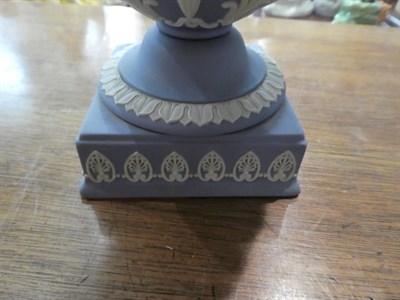 Lot 318 - A Wedgwood blue Jasper ware urn and cover decorated in the Classical taste with the Greek muses...