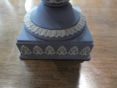 Lot 318 - A Wedgwood blue Jasper ware urn and cover decorated in the Classical taste with the Greek muses...