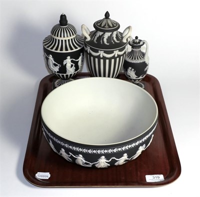 Lot 319 - Four pieces of Wedgwood black and striped Jasper ware comprising; a bowl (26cm diameter), a...