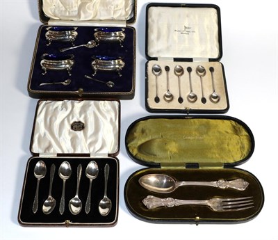 Lot 321 - A cased set of four George V silver salt cellars, by Robert Pringle and Sons, London, 1925 and...