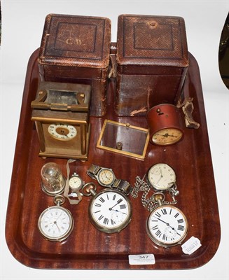 Lot 347 - A group of watches and clocks including two Goliath pocket watches, two further pocket watches,...