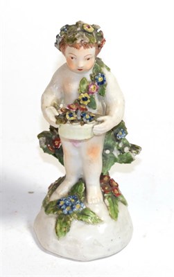 Lot 400 - A 19th century Derby figure of a flower boy, 14cm high