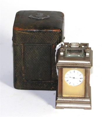 Lot 403 - A small brass carriage timepiece, in fitted case, inside fitted case, lid marked Howell James &...