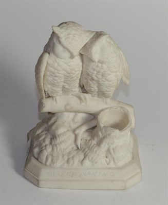 Lot 408 - A Parian group of two owls on a tree stump inscribed 'Match Making'