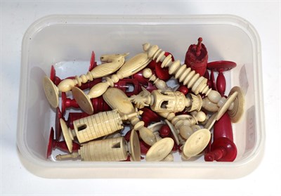 Lot 410 - A 19th century stained bone and ivory chess set