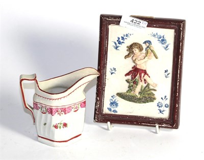 Lot 422 - A 19th century pearl ware plaque decorated in relief with a dancer and an English porcelain jug