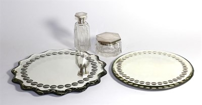 Lot 433 - Two French mirrored stands and two Art Deco 900 standard dressing table items, scalloped edge...