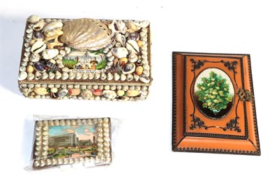 Lot 439 - A Victorian souvenir sewing-box and needle-case, each applied with shells and with a picture of the