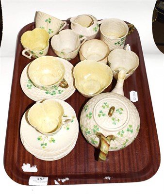 Lot 457 - Tray of assorted Belleek tea china, including cream, sugar and a mug