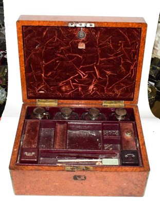 Lot 458 - A burr walnut metal mounted travelling vanity case by Coombs & co