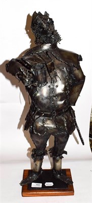 Lot 460 - A modernist metal sculpture of a drunken knight, 65cm high, unsigned