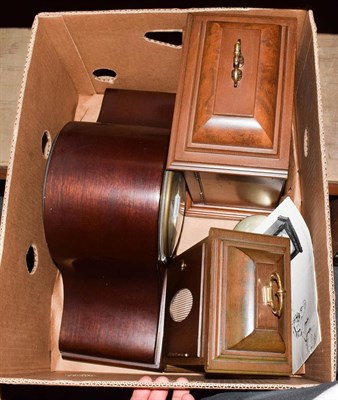 Lot 536 - Two mahogany veneered caddy top mantle clocks together with an earlier dome topped example (3)