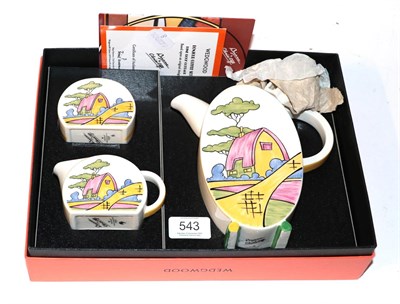 Lot 543 - A boxed Wedgwood 'Bizarre by Clarice Cliff' Bonjour coffee set