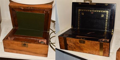 Lot 452 - A Victorian walnut and brass bound presentation writing slope and a smaller example (2)