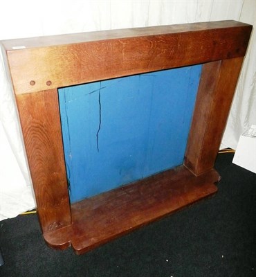 Lot 1647 - A Robert "Mouseman" Thompson Oak Fire Surround and Hearth, the plain case surround with...