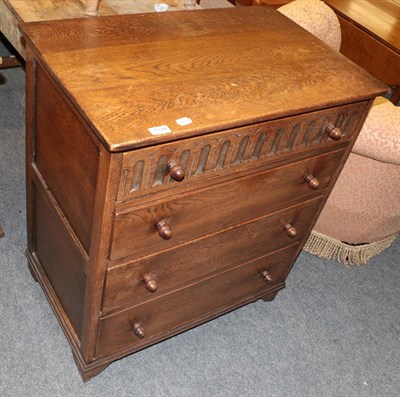Lot 1174 - A reproduction oak four-drawer chest