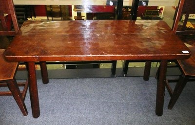 Lot 1656 - A Robert "Mouseman" Thompson Oak Pub Table, the adzed rectangular top on four tapering...