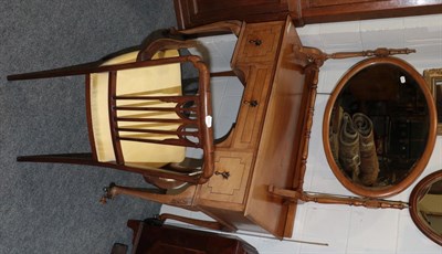 Lot 1188 - A 1930s walnut dressing table, an oval bevelled glass dressing table mirror and an Edwardian inlaid