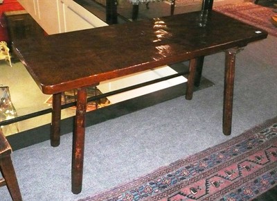 Lot 1658 - A Robert "Mouseman" Thompson Oak Pub Table, the adzed rectangular top on four tapering...