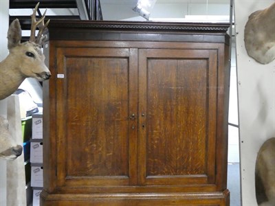 Lot 1198 - George III oak free standing corner cupboard, 121cm by 60cm by 204cm high