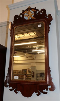 Lot 1207 - A George III fret work mirror, surmounted by a Ho Ho bird, with gilt slip