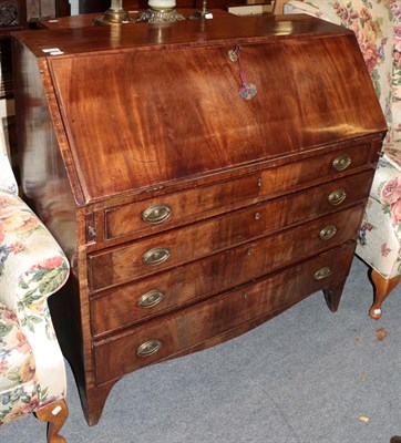 Lot 1212 - A George III mahogany bureau, 105cm by 49cm by 107cm high