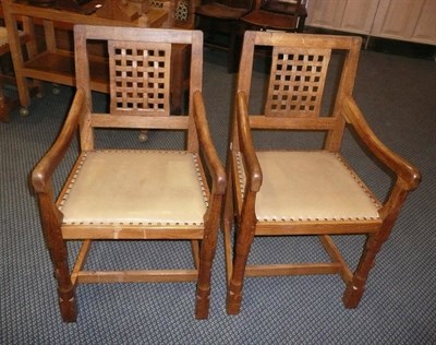 Lot 1661 - A Pair of Peter "Rabbitman" Heap Oak Lattice Back Armchairs, with upholstered seats, on turned...