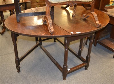 Lot 1291 - An early 18th century oak gateleg dining table, 147cm by 125cm by 71cm