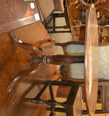 Lot 1292 - George III oak circular tilt top tripod table, 89cm by 69cm