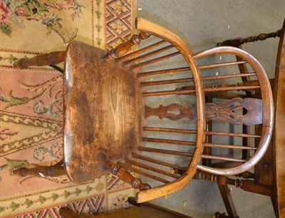 Lot 1310 - A 19th century ash and elm Windsor chair with crinoline stretcher