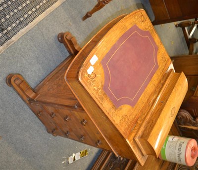 Lot 1313 - A Victorian inlaid walnut Davenport