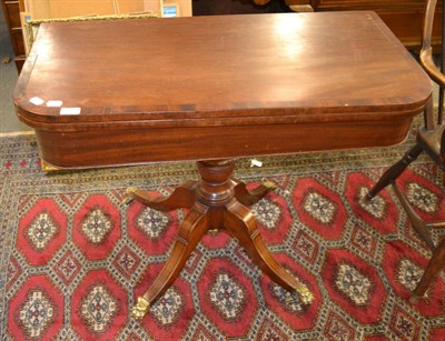 Lot 1318 - A Regency mahogany and ebony-strung fold-over tea table