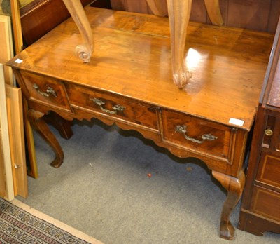 Lot 1321 - A walnut three drawer and pine lined table, mostly 18th century, 98cm by 55cm by 66cm