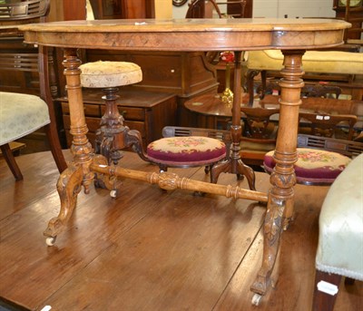 Lot 1325 - A Victorian figured walnut and quarter veneered occasional table