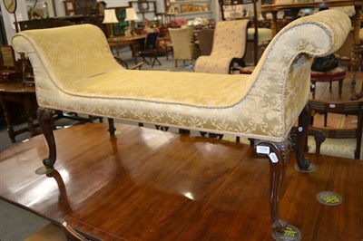 Lot 1335 - A carved mahogany scroll end window seat, late 19th century, raised on cabriole legs, 137cm by 48cm