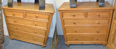 Lot 1353 - A pair of pine five drawer chests, of two short over three long graduated drawers, 91cm by 41cm...