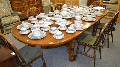 Lot 1358 - An oak Titchmarsh & Goodwin style extending dining table, with two additional leaves, 270cm...