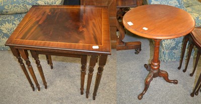 Lot 1368 - A reproduction glass top and metal trolley, a beech six-tier open bookcase, a nest of oak laminated