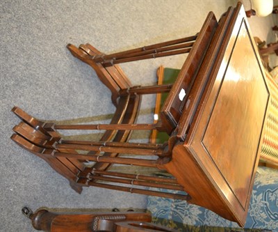 Lot 1370 - Four Edwardian walnut nesting tables, the largest 56cm by 43cm by 73cm