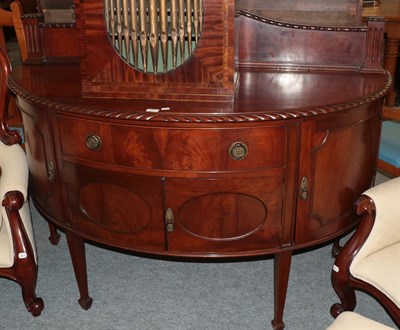 Lot 1375 - An early 20th century mahogany sideboard of D-shaped form