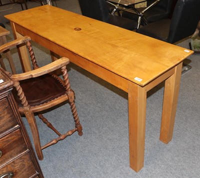 Lot 1388 - Modern beech side table on square legs, bearing oval panel with the letter 'D' surmounted by a...