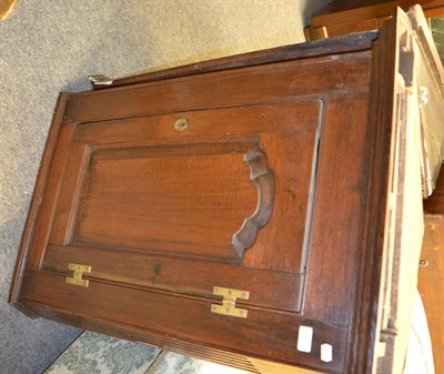 Lot 1404 - A George III oak corner cupboard with panel door