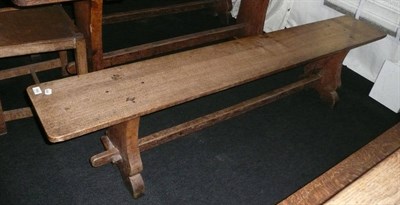 Lot 1682 - A Pair of Martin "Lizardman" Dutton Oak 6' Benches, each with shaped supports joined by a...